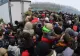 FOTO + VIDEO | Imaginea disperării: Mii de oameni se calcă în picioare pentru o bucată de pâine la granița dintre Polonia și Belarus