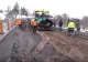 Treabă românească: Muncitorii au turnat asfalt direct în noroi, pe DN17