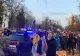  FOTO Protest la Ambasada Rusiei din București. Tânăr reținut de jandarmi, fotografia lui Putin, mânjită cu vopsea roșie