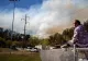 FOTO |  INCENDIU devastator de vegetaţie în SUA: cel puțin 166 de case DISTRUSE, mii de persoane EVACUATE