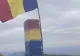 Borna de pe vârful Piatra Secuiului, vopsită în culorile Drapelului Național
