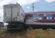 TIR lovit de tren, în Călărași! Șoferul a suferit un ATAC DE PANICĂ: circulația feroviară și rutieră, întrerupte - GALERIE FOTO