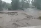 VIDEO - Viitură devastatoare, un râu a ieșit din matcă - Furtuni în mai multe zone din țară după valul de caniculă