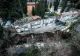 Cel puțin 100 de sicrie și urne au ajuns într-un pârâu, după o alunecare de teren, în Italia - VIDEO
