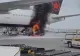 Avion cuprins de flăcări după ce o camionetă a luat foc chiar sub aeronavă! Panică uriașă pe un aeroport din Canada - VIDEO