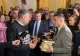 Schimb de replici între Marcel Ciolacu și George Simion - Liderul AUR i-a dat premierului un volum din Harry Potter