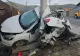 Accident șocant, în jud. Caraș-Severin: mașină încolăcită pe stâlp, după ce a fost lovită de un șofer începător cu BMW - FOTO