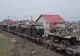Tren cu zeci de vehicule militare, surprins la granița cu Ucraina. Explicația MApN - VIDEO