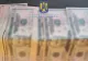 Tânără de 24 de ani, reţinută după ce a furat bani din locuinţa părinţilor şi i-a înlocuit cu bancnote falsificate. Cum a fost depistată
