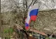 Zeci de steaguri rusești flutură mândre la granița de sud a României. Cum a fost împânzită zona de însemnele lui Putin