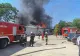 Incendiu violent, cu flacără puternică și degajări mari de fum, la un service auto din București: două persoane intoxicate - FOTO