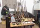 Percheziții în județul Tulcea, inclusiv în casa unui fost profesor: polițiștii au confiscat muniție letală, arme și o grenadă activă - FOTO