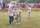 Un nou sport în România. Copiii se întrec în prinderea purcelușilor