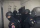 Cunoscut cântăreț de trap, suspect într-un dosar de șantaj și camătă. Este cunoscut pentru mesajele sale violente