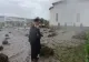 Arhiepiscopul Casian Crăciun a curățat cu mătura mâlul dintr-o biserică afectată de inundații, la Galați. Imagini emoționate cu prăpădul lăsat în urmă de ape