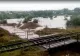 Circulația trenurilor, dată peste cap de inundații. O linie de calea ferată, devastată de viiturile puternice VIDEO