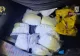 Dealeri de droguri, prinși cu 17 kilograme de substanțe interzise în portbagaj, la Cluj. Unul dintre ei a ascuns cheia mașinii în pantaloni!
