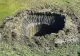 Misterul craterelor gigantice apărute brusc: Explicația științifică surprinzătoare a unui fenomen alarmant
