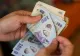 Salariul minim european, adoptat în România