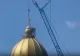 A fost montată crucea de pe turla Catedralei Mântuirii Neamului. Are șapte metri și șapte tone