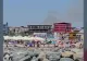 Panică pe plajă în cel mai aglomerat weekend al anului. Incendiu uriaș, flăcările i-au panicat pe turiști