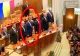 Ionuț Moșteanu, ministrul fără școală, soarbe din cafea în timpul intonării imnului. Rezistul își „asasizează” fără milă demnitatea