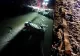 Accident grav în Vâlcea. O mașină a rupt parapetul unui pod și a căzut în râu