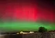 Aurora boreală, vizibilă în România, după o furtună geomagnetică severă. Imagini ireale surprinse de martori - FOTO