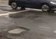 Românii au cratere pe străzi, chiar dacă plătesc impozite mărite. Condițiile mai bune promise de Bolojan prin creșterea taxelor, inexistente - VIDEO