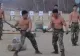 Kim Jong Un a privit zâmbind cum soldații săi erau loviți cu topoare în burtă. Spectacolul grotesc care a precedat testul unei rachete capabilă să ajungă în SUA - VIDEO