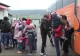 Părintele Damaschin a adus lumina în casele nevoiașe. Pachete cu haine și mâncare de Paște pentru zeci de mii de copii - VIDEO
