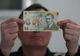 Un copil de 11 ani din judeţul Timiş este cercetat pentru că a falsificat bancnote