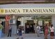 Banca Transilvania a înghițit o rivală, unde mulți români aveau conturi. Tranzacția bancară a anului, sub lupa Consiliului Concurenței 