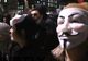CIOCNIRI DURE la Londra între mascaţii Anonymous şi poliţie. "VREM REVOLUŢIE" 
