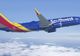 Avion american deturnat. O femeie încercat să deschidă ușa avionului în timpul zborului