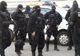 DIICOT și Poliția Română, acțiune internațională împotriva cărăușilor de bani. Prejudiciu URIAȘ