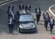 Imagini fabuloase. 12 bodyguarzi au alergat lângă limuzina lui Kim Jong-un, fără să obosească