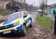 Mașină a poliției rămasă împotmolită în noroi pe o stradă din Brăila