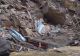 VIDEO Cimitir distrus de o alunecare de teren. Sute de sicrie au ajuns în mare