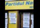 Un sediu PNL a fost VANDALIZAT - Afișe care anunță protestul AUR, lipite peste tot