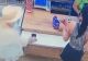 O femeie de 84 de ani, filmată în timp ce fură un telefon mobil dintr-un magazin