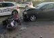 Accident rutier în București: Un șofer s-a urcat cu mașina peste un motociclist