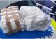 Rețea de trafic de droguri de mare risc destructurată în Vrancea. 15 kilograme de canabis, descoperite de poliţişti într-o mașină